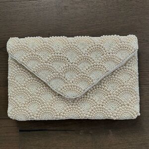 Lulu’s beaded clutch/ shoulder bag